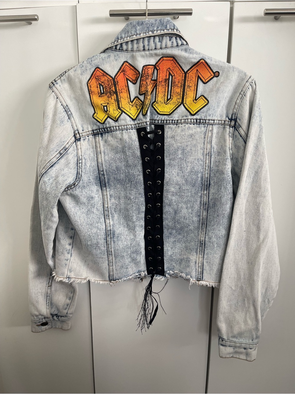 official AC/DC light-blue acid wash cropped denim jacket